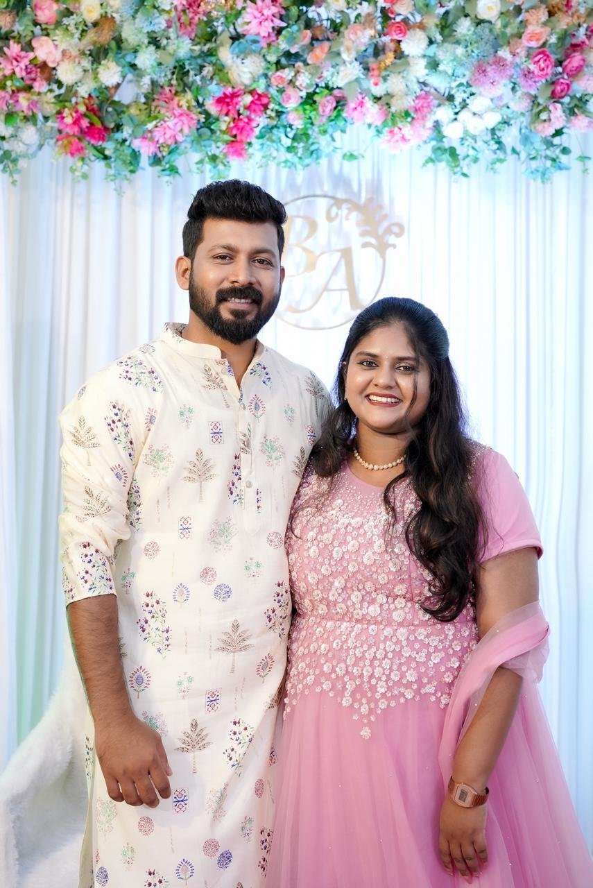 Bibin and Alicia together in their engagement outfits